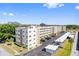 Aerial view of the building, showing parking and landscaping at 5705 80Th N St # 210, St Petersburg, FL 33709