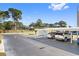 Covered parking area with ample spaces for residents at 5705 80Th N St # 210, St Petersburg, FL 33709