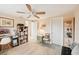 Bedroom with a seating area and built in shelving at 5780 Elton Rd, Venice, FL 34293