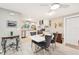 Modern kitchen with stainless steel appliances and white cabinets at 5780 Elton Rd, Venice, FL 34293