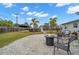 Charming backyard with a fire pit and ample space for entertaining at 5871 49Th N Ave, Kenneth City, FL 33709