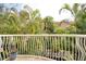 Private balcony overlooking lush tropical landscaping at 6224 Vista Verde W Dr, St Petersburg, FL 33707