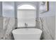 Relaxing bathroom featuring a freestanding soaking tub and marble accents at 6224 Vista Verde W Dr, St Petersburg, FL 33707