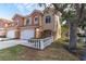 Two-story townhome with double garage and manicured lawn at 6224 Vista Verde W Dr, St Petersburg, FL 33707