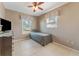 Cozy bedroom with a twin bed and window seat at 6512 2Nd Ave Ne, Bradenton, FL 34208