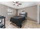 Bright bedroom with a double bed and ceiling fan at 6512 2Nd Ave Ne, Bradenton, FL 34208