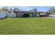 House with a spacious lawn and single-car garage at 6512 2Nd Ave Ne, Bradenton, FL 34208