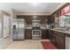 Kitchen with stainless steel appliances and tile floor at 6512 2Nd Ave Ne, Bradenton, FL 34208