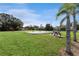 Community playground with play equipment and picnic tables at 6512 2Nd Ave Ne, Bradenton, FL 34208