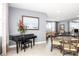 Elegant common area features a baby grand piano at 750 Island Way # 401, Clearwater Beach, FL 33767