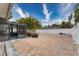 Large backyard patio, adjacent to a screened porch at 809 Mandalay Ave, Clearwater Beach, FL 33767