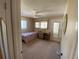 Small bedroom with twin bed, desk, and chair at 8525 111Th St # 205, Seminole, FL 33772