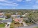 Bird's-eye view of a home showcasing its location in a tree-lined neighborhood at 9923 119Th Way, Seminole, FL 33772