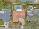 Top-down view of the house, pool, and surrounding landscape at 9923 119Th Way, Seminole, FL 33772