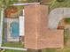 Directly above view of house, pool, and driveway at 9923 119Th Way, Seminole, FL 33772