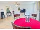 Comfortable living room with a round dining table at 102 Cambridge Trl # 229, Sun City Center, FL 33573