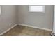 Simple bedroom with neutral walls and tile floors at 10591 116Th Ter, Largo, FL 33773