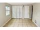 Spacious living area with tile floors and abundant natural light at 10591 116Th Ter, Largo, FL 33773