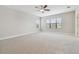 Bright bedroom with window and ceiling fan at 10825 Charmwood Dr, Riverview, FL 33569