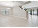 Dining room with tile flooring and access to the kitchen and Gathering room at 10825 Charmwood Dr, Riverview, FL 33569