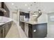 Modern kitchen with stainless steel appliances and an island at 10825 Charmwood Dr, Riverview, FL 33569