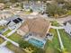 Home with pool and fenced backyard, viewed from above at 11424 Zenith Cir, Tampa, FL 33635