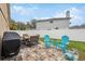 Outdoor patio with seating area, grill, and plenty of space for entertaining at 11424 Zenith Cir, Tampa, FL 33635