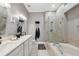 Bathroom boasts a large soaking tub and double vanity at 11424 Zenith Cir, Tampa, FL 33635