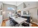 Elegant dining room with chandelier and hardwood floors at 11424 Zenith Cir, Tampa, FL 33635