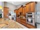 Kitchen with stainless steel appliances and granite countertops at 11424 Zenith Cir, Tampa, FL 33635