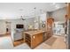 Bright kitchen with granite countertops and wood cabinets at 11424 Zenith Cir, Tampa, FL 33635