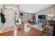 Living room with hardwood floors and a cozy seating area at 11424 Zenith Cir, Tampa, FL 33635