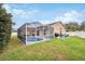 Inviting screened-in pool area, perfect for relaxation and entertainment at 11424 Zenith Cir, Tampa, FL 33635