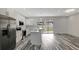 Modern kitchen with stainless steel appliances and island at 11926 Riverhills Dr, Tampa, FL 33617