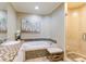 Elegant bathroom with double vanity, soaking tub, and separate shower at 1200 Gulf Blvd # 102, Clearwater Beach, FL 33767