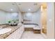 Elegant bathroom with double vanity, soaking tub, and separate shower at 1200 Gulf Blvd # 102, Clearwater Beach, FL 33767