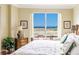 Main bedroom with stunning ocean views and comfortable furnishings at 1200 Gulf Blvd # 102, Clearwater Beach, FL 33767