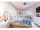 Comfortable bedroom with a queen-size bed and ocean views at 1200 Gulf Blvd # 102, Clearwater Beach, FL 33767