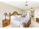 Spacious bedroom with a king-size bed and access to a private balcony at 1200 Gulf Blvd # 102, Clearwater Beach, FL 33767