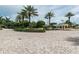 Community entrance with brick pavers and landscaping at 1200 Gulf Blvd # 102, Clearwater Beach, FL 33767