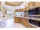 Modern kitchen with granite countertops and stainless steel appliances at 1200 Gulf Blvd # 102, Clearwater Beach, FL 33767