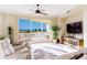 Spacious living room featuring ample natural light and ocean views at 1200 Gulf Blvd # 102, Clearwater Beach, FL 33767