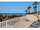 Oceanfront balcony with patio furniture, offering stunning ocean views at 1200 Gulf Blvd # 102, Clearwater Beach, FL 33767