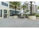 Outdoor patio seating area with tables and umbrellas at 1200 Gulf Blvd # 102, Clearwater Beach, FL 33767