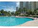 Inviting pool with plenty of lounge chairs at 1200 Gulf Blvd # 102, Clearwater Beach, FL 33767