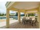 Covered seating area overlooking a tennis court at 1200 Gulf Blvd # 102, Clearwater Beach, FL 33767