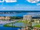 Luxury high-rise condo building overlooking the waterfront with marina and pool at 130 Riviera Dunes Way # 605, Palmetto, FL 34221