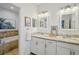 Double vanity bathroom with granite countertops and soaking tub at 15209 Leith Walk Ln, Tampa, FL 33618