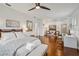 Bright main bedroom with sitting area and hardwood floors at 15209 Leith Walk Ln, Tampa, FL 33618