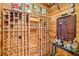 Well-stocked wine cellar with ample storage for bottles and bar at 15209 Leith Walk Ln, Tampa, FL 33618